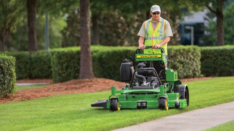 QUIKTRAK STAND ON MOWERS